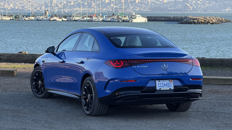 Front 3/4 view of a blue 2026 Mercedes-Benz CLA EV