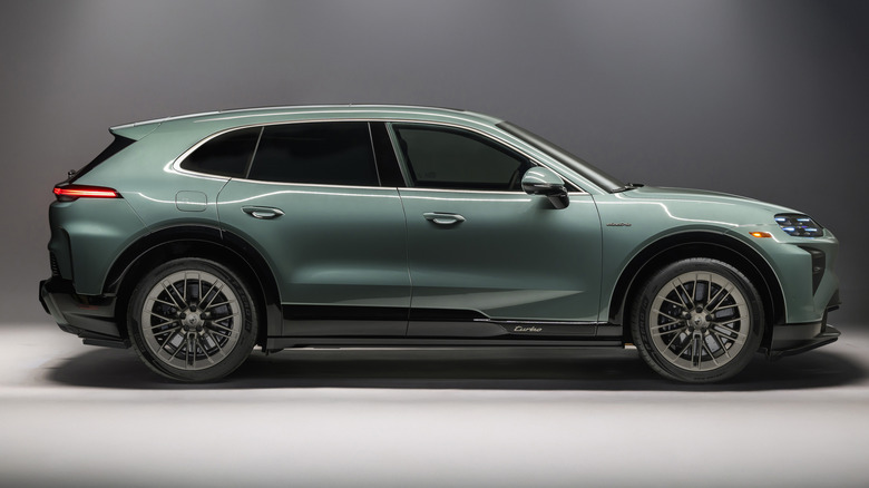 Side view of a green 2026 Porsche Cayenne Turbo Electric