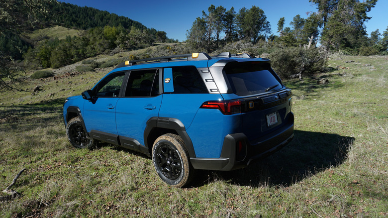 Blue 2026 Subaru Outback Wilderness rear 3/4 view