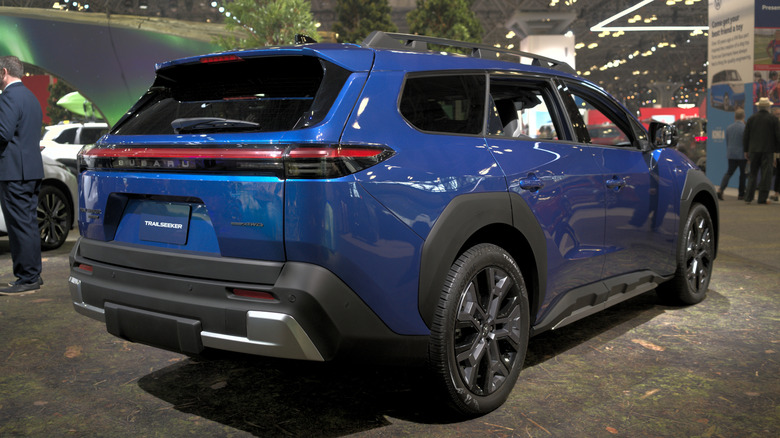 Rear 3/4 view of a blue Subaru Trailseeker