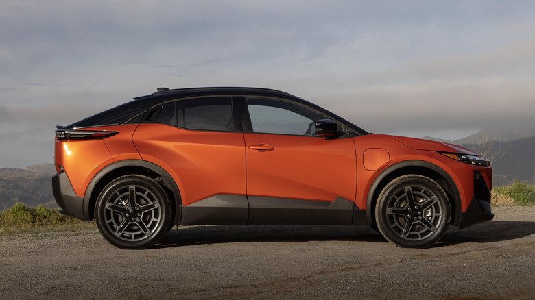 Side view of an orange 2026 Subaru Uncharted