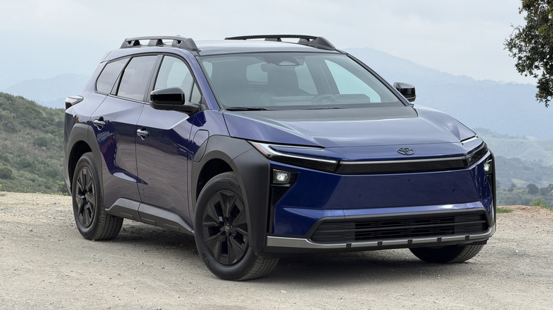 Front 3/4 view of a blue Toyota bZ Woodland