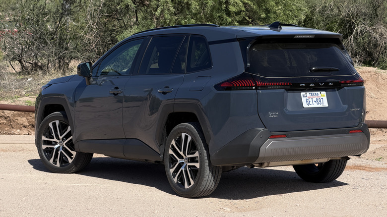 Rear 3/4 view of a gray 2026 Toyota RAV4 Limited