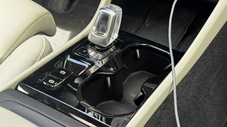 A close-up of the center console in the XC40 showing the crystal shifter