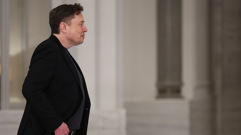 lon Musk attends a state dinner at the Lusail Palace on May 14, 2025, in Doha, Qatar.