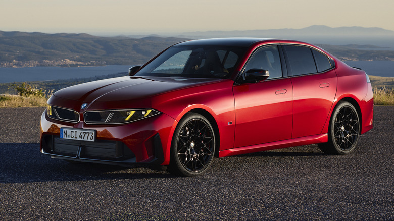 Front 3/4 view of a red BMW M350