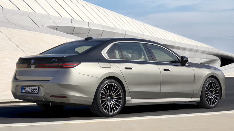 Rear 3/4 view of a two-tone 2027 BMW 7 Series