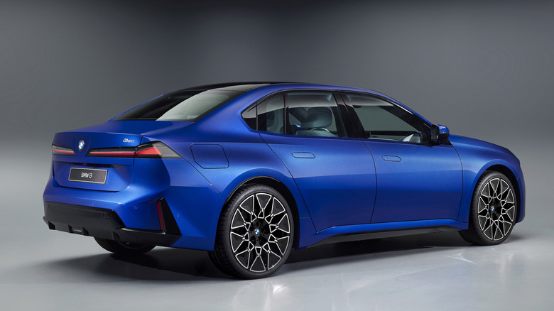 Rear 3/4 view of a blue BMW i3