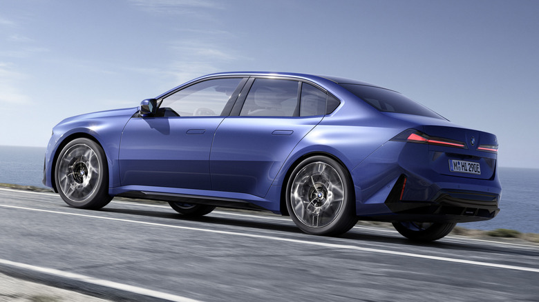 Rear 3/4 view of a blue BMW i3