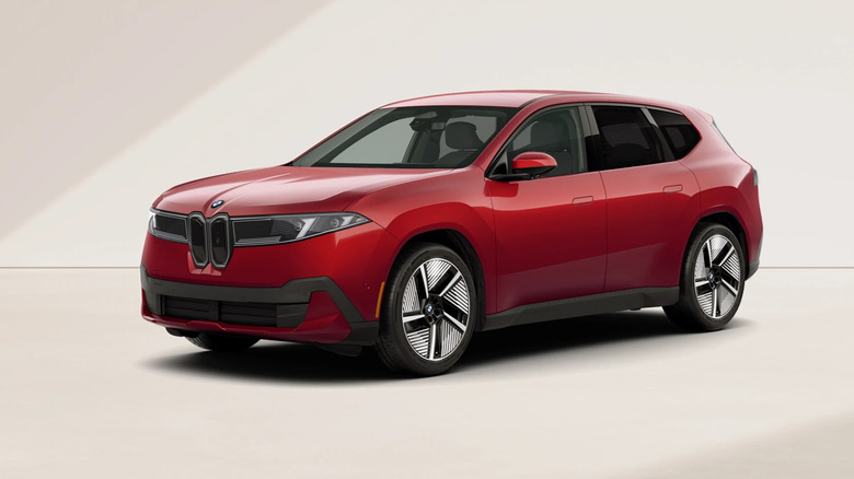 Front 3/4 view of a red BMW iX3