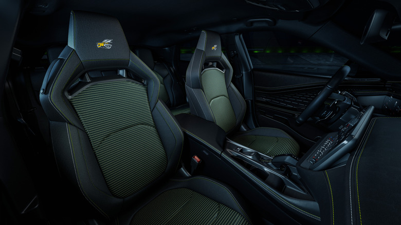A photo of the high-back seats in the Charger Super Bee with yellow-striped central inserts