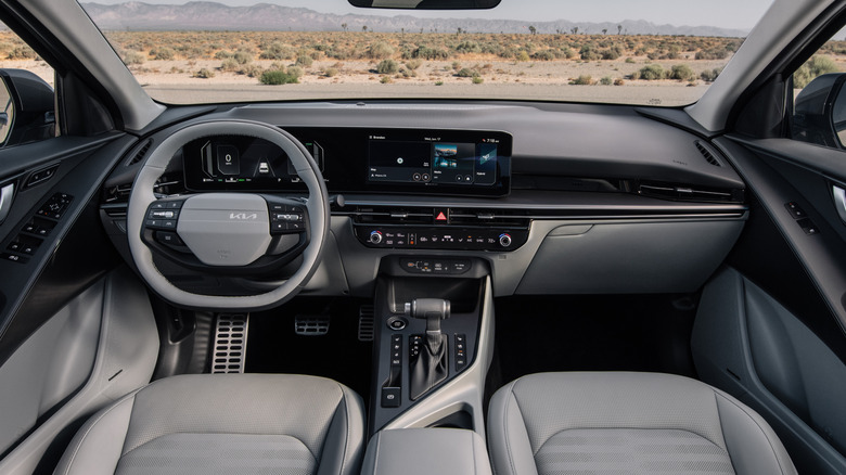 A wide shot looking at the Niro's new dashboard in gray with a view of the desert out the windshield