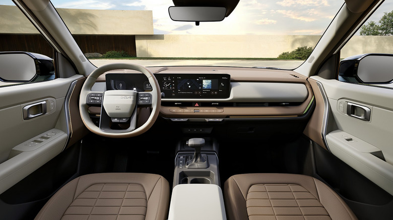 Beige and brown interior of a 2027 Kia Seltos