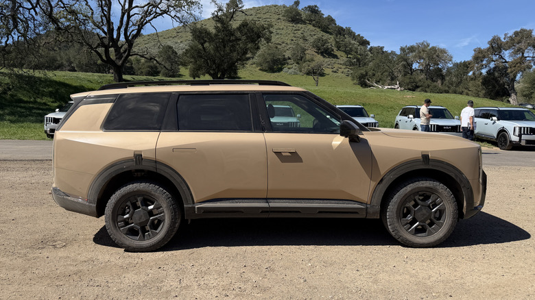 Side view of a beige Kia Telluride X-Pro