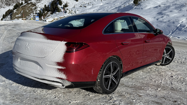 rear 3/4 view of a red 2027 Mercedes-Benz CLA220 4Matic hybrid