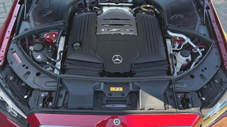 A look down under the hood of the S580 showing the new M177 Evo V8 parked on brick