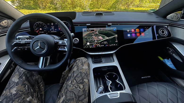 A wide shot from my POV in the driver's seaqt showing the dash of the new S-Class with three screens