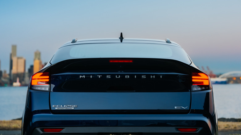 Rear view of a blue 2027 Mitsubishi Eclipse Sportback.