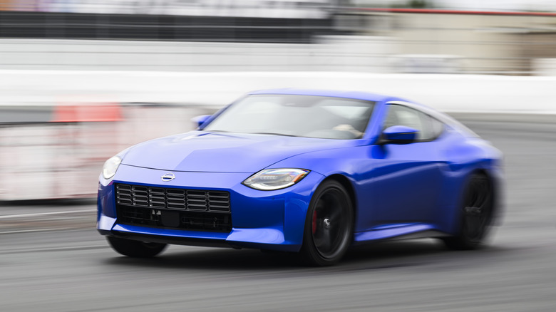 2027 Nissan Z Nismo w/ manual transmission blue front 3/4