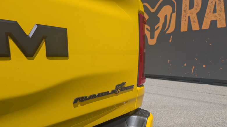 Badge of the Ram 1500 Rumble Bee SRT parked on the Chelsea Proving Grounds test track
