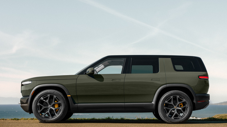 Side view of a green Rivian R2