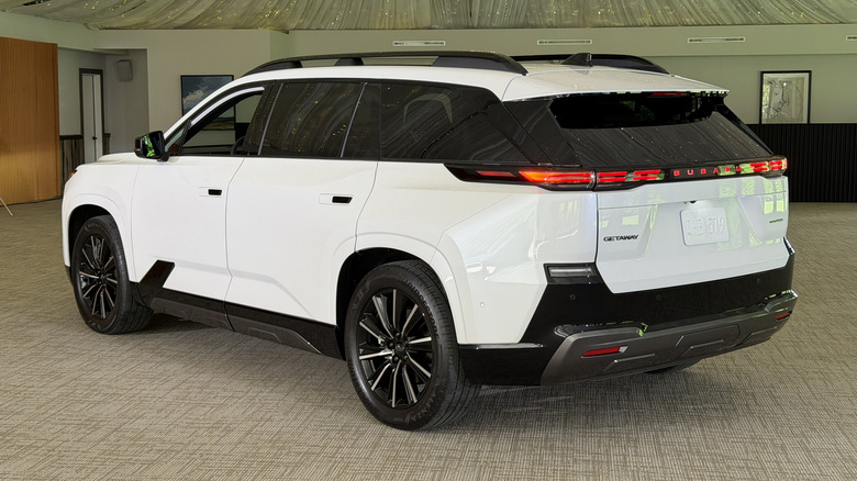 Rear 3/4 view of a white 2027 Subaru Getaway