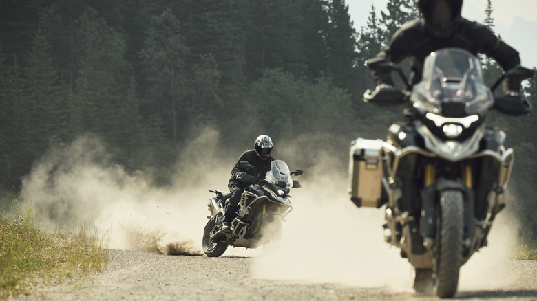 Triumph Tigers off road in dust