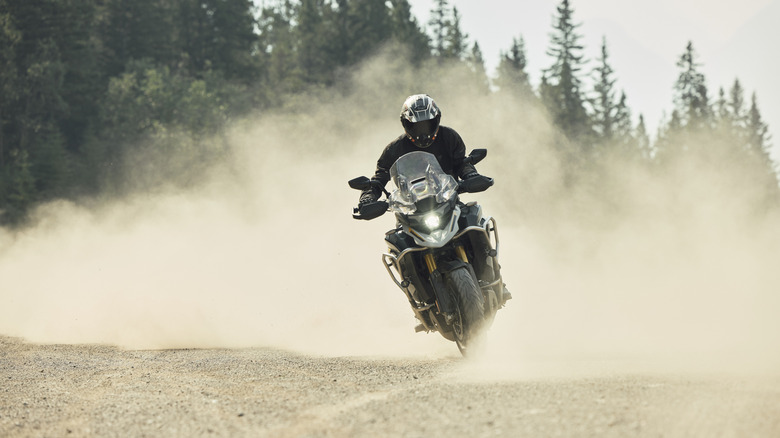 Triumph Tiger off road in dust