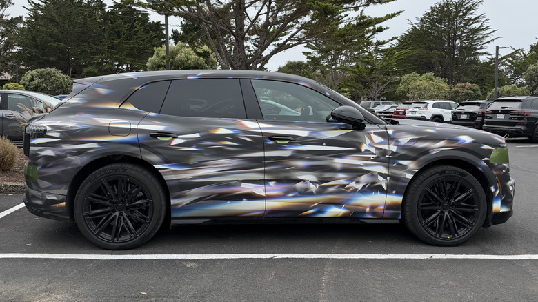 Side view of a camouflaged Bentley Torcal EV prototype