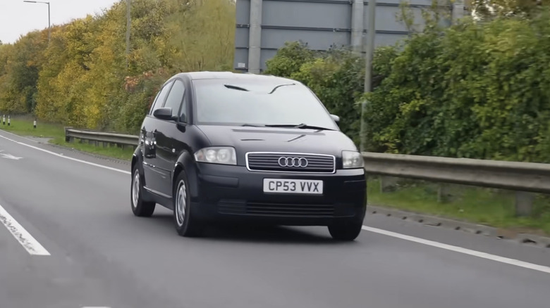 An Audi A2 driving down the motorway on its 100 MPG drive