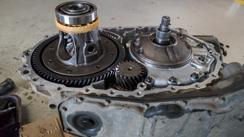 A dismantled gearbox laid retired connected nan floor.