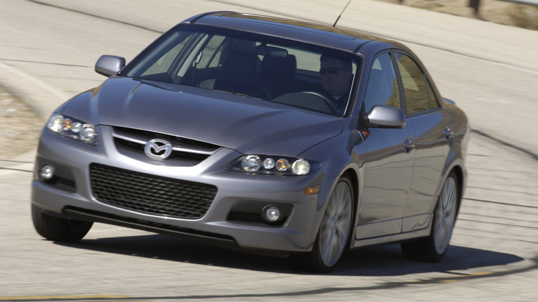 A gray MAZDASPEED6 takes a corner.