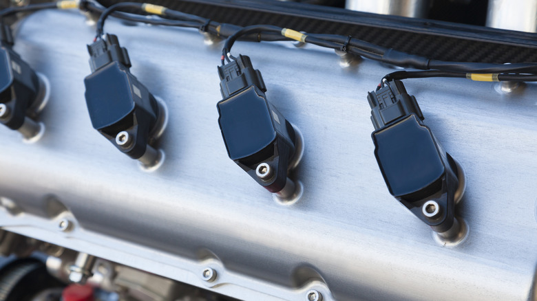 Spark plugs installed on a high-performance engine