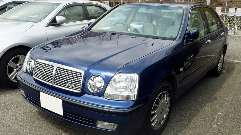 Toyota Progres in blue parked