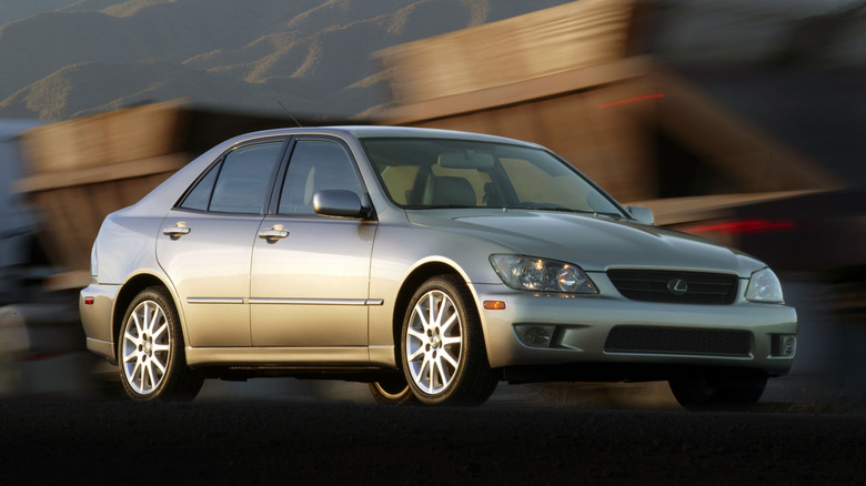 Front 3/4 view of a silver 2003 Lexus IS 300.