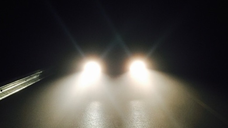 Oncoming car with headlights on
