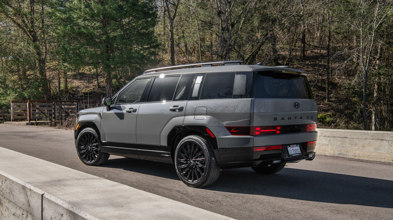 2026 Hyundai Santa Fe rear 3/4 parked on small bridge