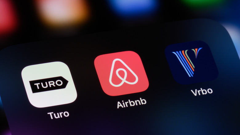 Turo, airbnb, and Vrbo apps on a phone