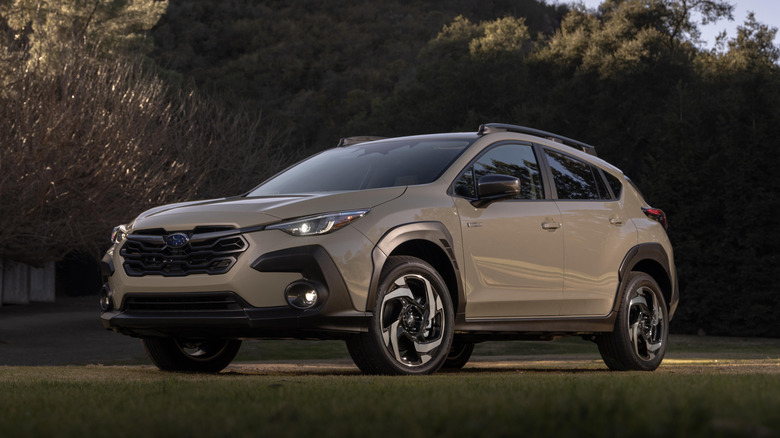 A 2026 Subaru Crosstrek near a tree.