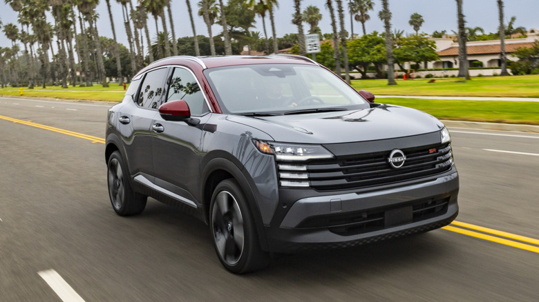 A gray 2026 Nissan Kicks on a roadway.