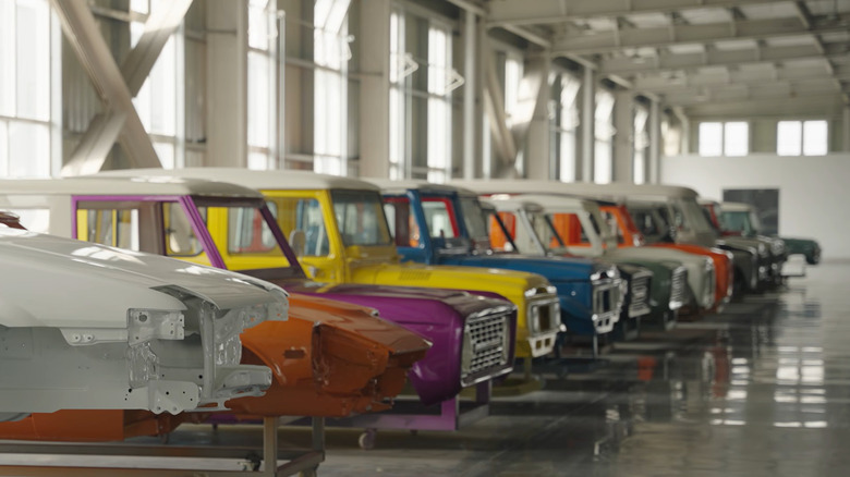 A line of recreated classic car body shells in the Juncheng Vehicle Co. factory