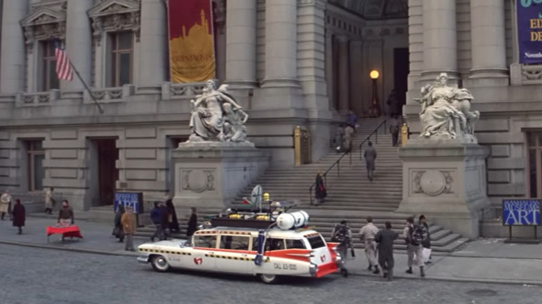 The Ecto-1 parked in front of the New York Public Library in the Ghostbusters movie