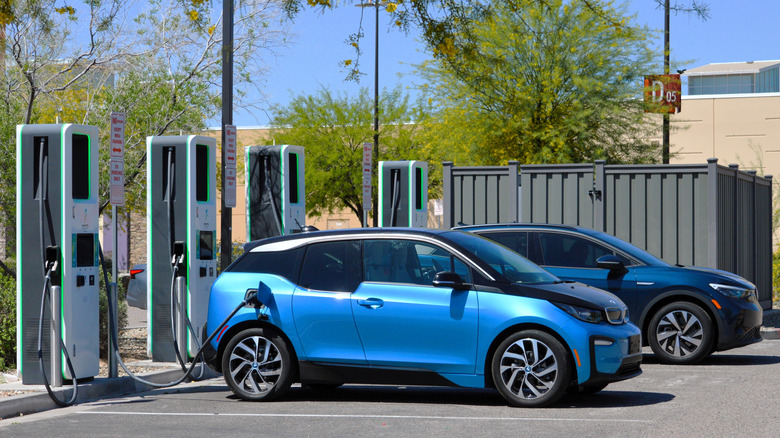 BMW i3 charging at an Electrify America charging station