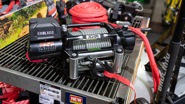 A Badland ZXR 15,000-pound winch on a work table