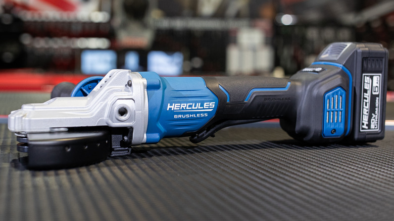 A 20-volt Hercules Brushless Cordless Paddle Switch Grinder with flathead design laying on a table.