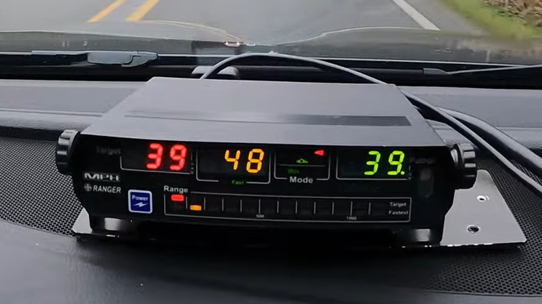 MPH Ranger EZ radar unit mounted on a car dashboard.