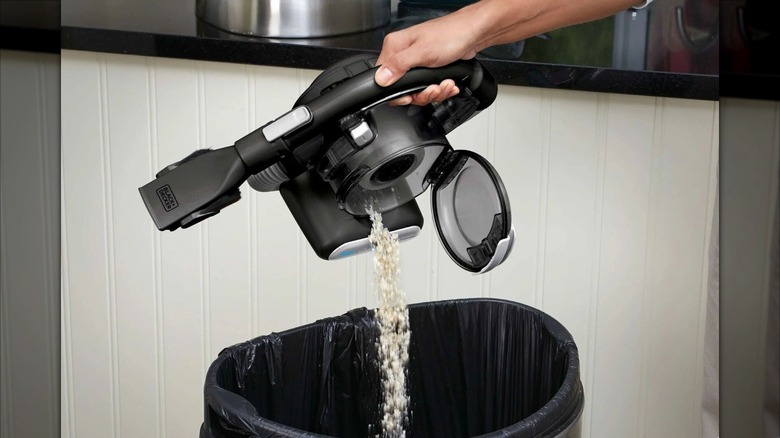 The Black and Decker DustBuster Flex's large dustbowl opens up easily and empties debris directly into a trash bin.