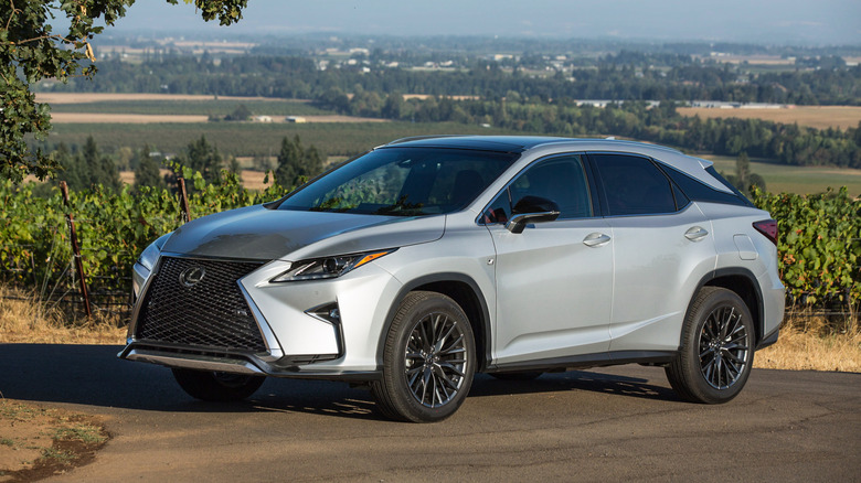 Front 3/4 view of a silver 2016 Lexus RX 350 F Sport.
