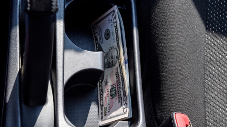 Cash successful a car console