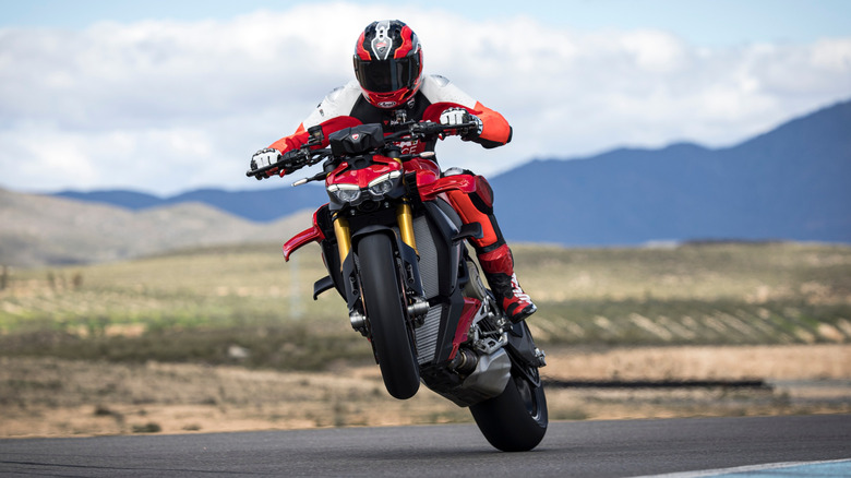 A red Ducati Streetfighter V4 on a track
